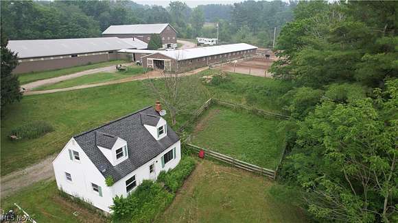 22.2 Acres of Agricultural Land with Home for Sale in Novelty, Ohio