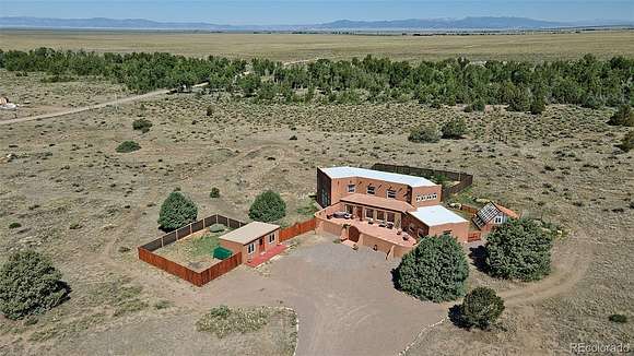 3.2 Acres of Residential Land with Home for Sale in Crestone, Colorado