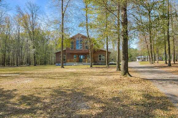 16.6 Acres of Land with Home for Sale in Girard, Georgia