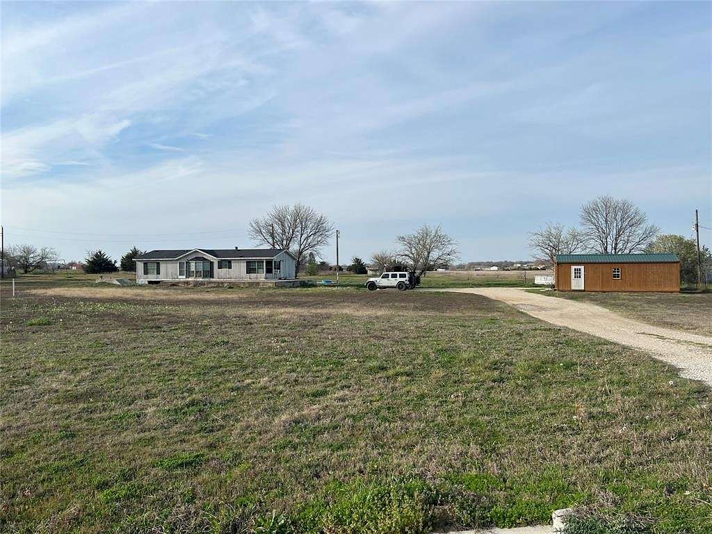 5 Acres of Residential Land with Home for Sale in Gainesville, Texas