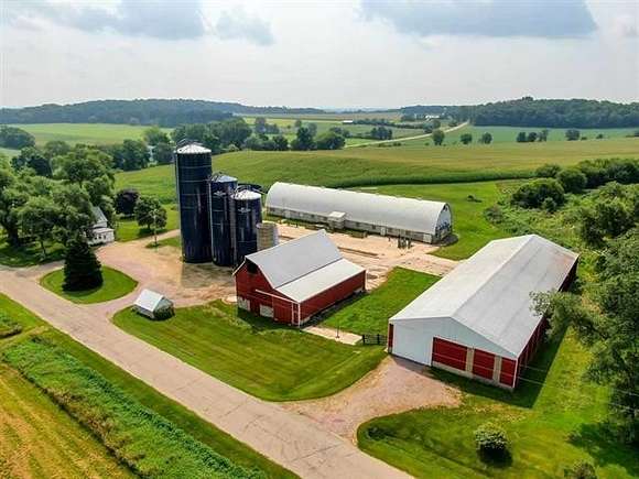 133 Acres of Agricultural Land with Home for Sale in Portage, Wisconsin