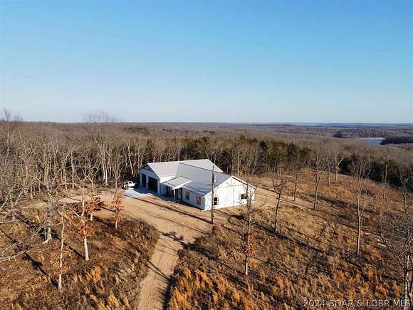 12.9 Acres of Land with Home for Sale in Warsaw, Missouri