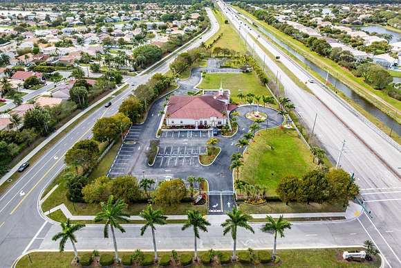 4.9 Acres of Improved Commercial Land for Sale in Lake Worth, Florida