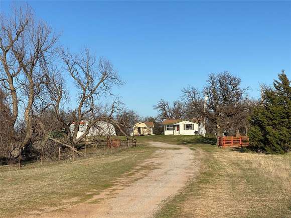 5 Acres of Residential Land with Home for Sale in Crescent, Oklahoma
