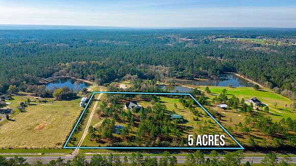 5 Acres of Residential Land with Home for Sale in Baker, Florida