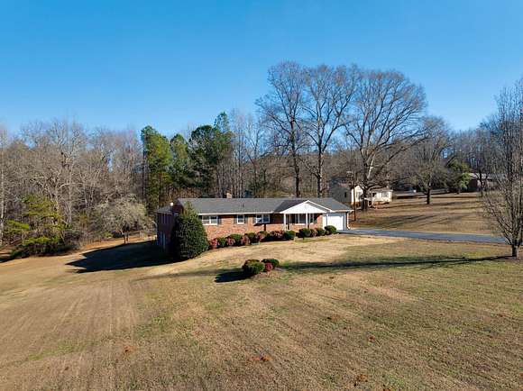 5.4 Acres of Residential Land with Home for Sale in Enoree, South Carolina