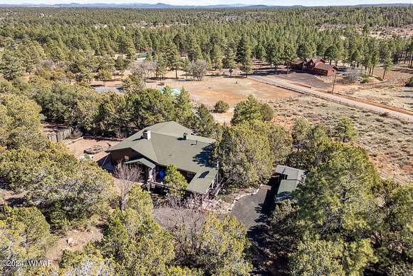 4.8 Acres of Residential Land with Home for Sale in Show Low, Arizona