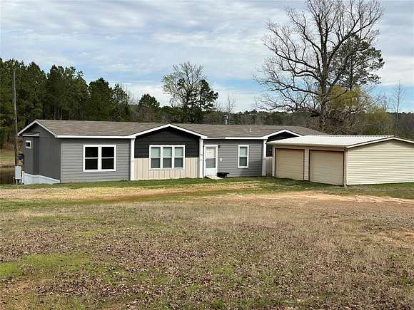 4.7 Acres of Residential Land with Home for Sale in Minden, Louisiana