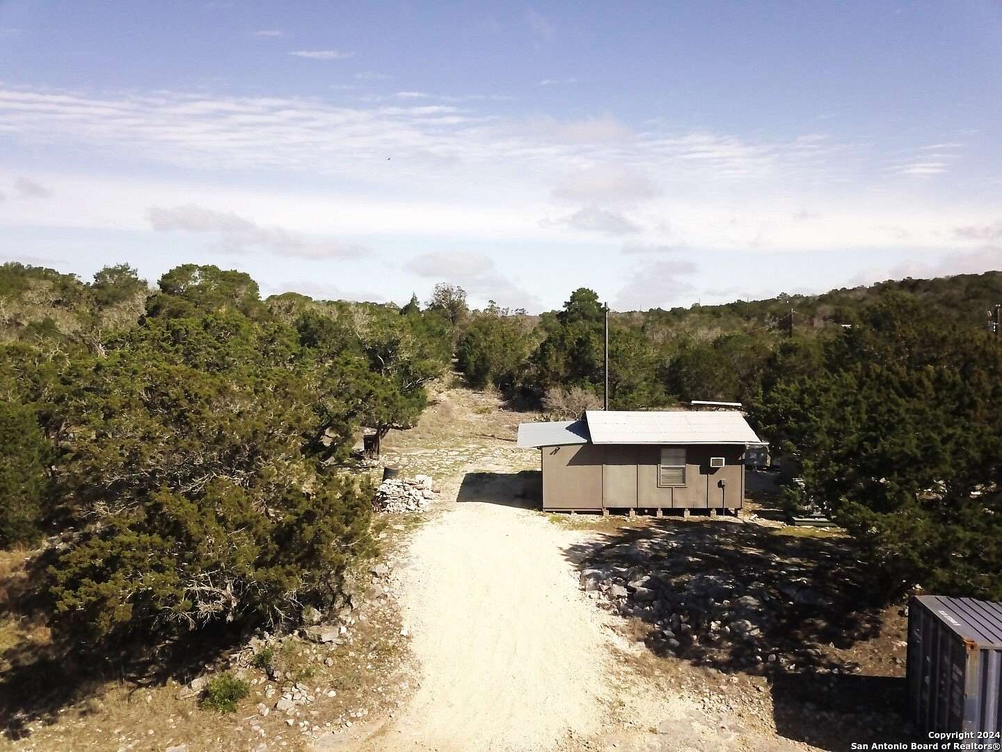 80 Acres of Recreational Land with Home for Sale in Camp Wood, Texas