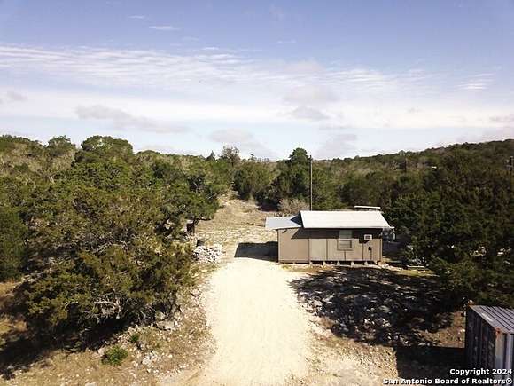 80 Acres of Land with Home for Sale in Camp Wood, Texas