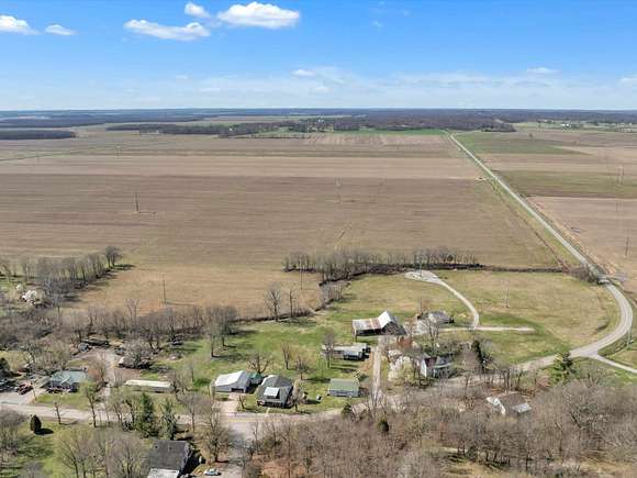 16.5 Acres of Land with Home for Sale in Slaughters, Kentucky