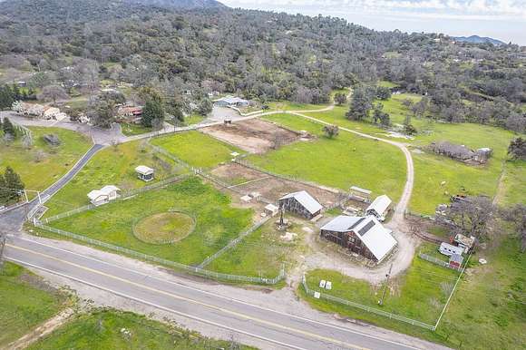 126 Acres of Agricultural Land with Home for Sale in Prather, California