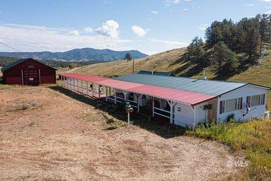 36.9 Acres of Agricultural Land with Home for Sale in Westcliffe, Colorado
