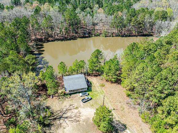 27.4 Acres of Land with Home for Sale in Milledgeville, Georgia