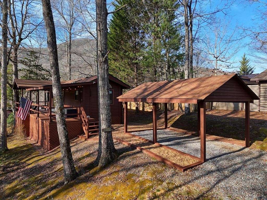 0.71 Acres of Residential Land with Home for Sale in Hiawassee, Georgia