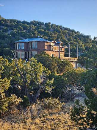 28 Acres of Recreational Land with Home for Sale in Cerrillos, New Mexico