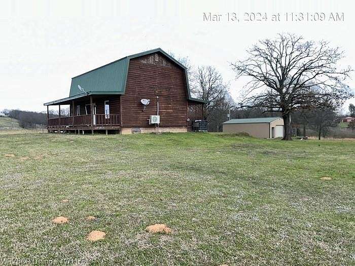 8.4 Acres of Residential Land with Home for Sale in Muldrow, Oklahoma