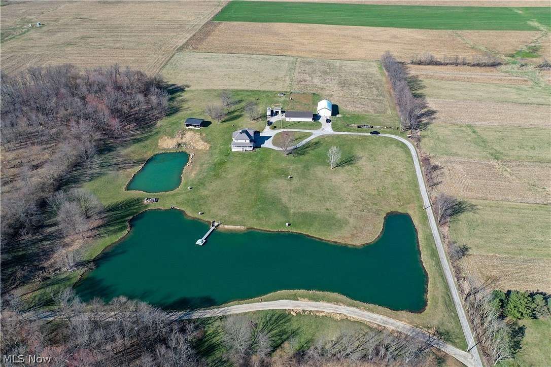 12.1 Acres of Land with Home for Auction in Navarre, Ohio