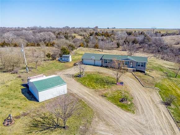 20 Acres of Agricultural Land with Home for Sale in Truro, Iowa
