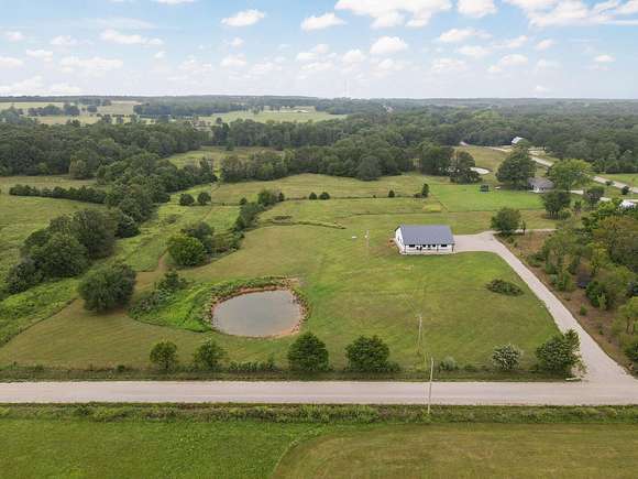 12.4 Acres of Land with Home for Sale in Phillipsburg, Missouri