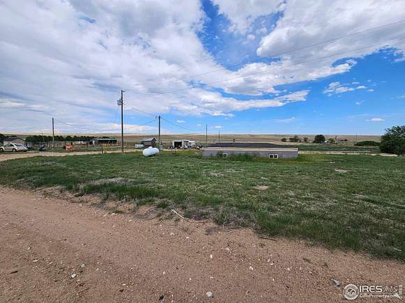 80 Acres of Agricultural Land with Home for Sale in Fort Morgan, Colorado