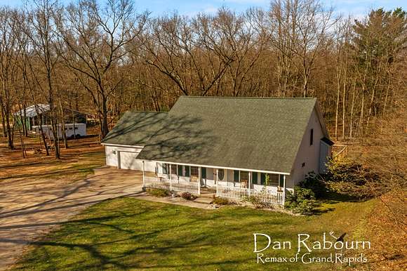 9.4 Acres of Land with Home for Sale in Twin Lake, Michigan