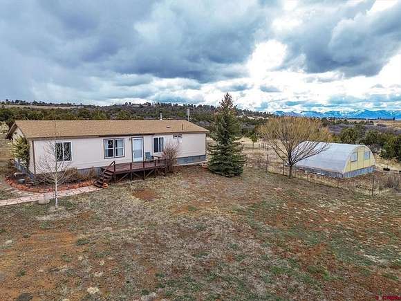 8 Acres of Residential Land with Home for Sale in Dolores, Colorado