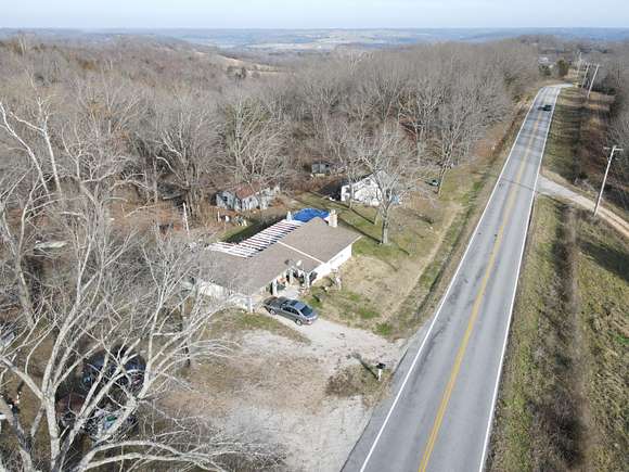 48.9 Acres of Land with Home for Sale in Cape Fair, Missouri