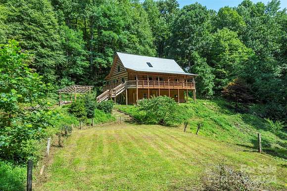 10.7 Acres of Land with Home for Sale in Black Mountain, North Carolina