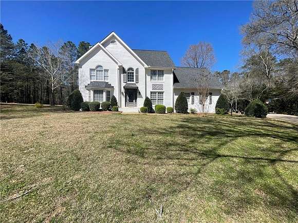 3.2 Acres of Residential Land with Home for Sale in Sandersville, Georgia