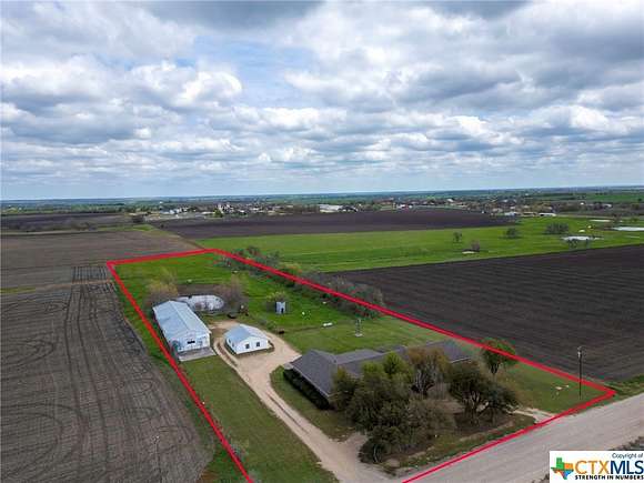 4.689 Acres of Residential Land with Home for Sale in Lott, Texas