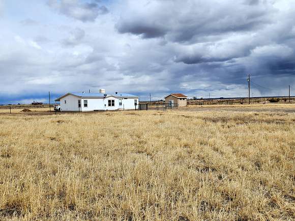 5 Acres of Land with Home for Sale in Moriarty, New Mexico