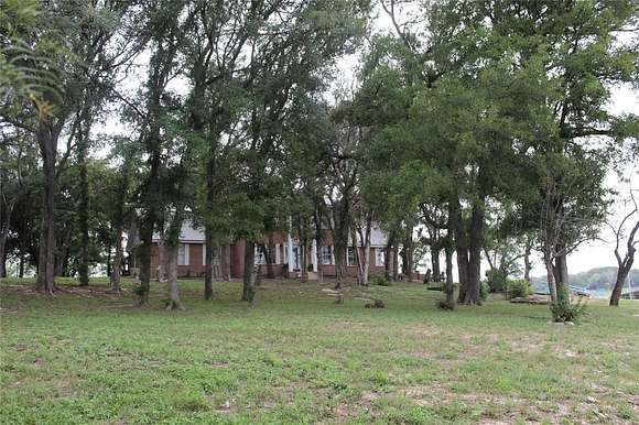 2 Acres of Residential Land with Home for Sale in Eastland, Texas