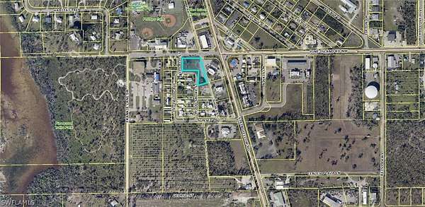 0.75 Acres of Mixed-Use Land for Sale in Bokeelia, Florida