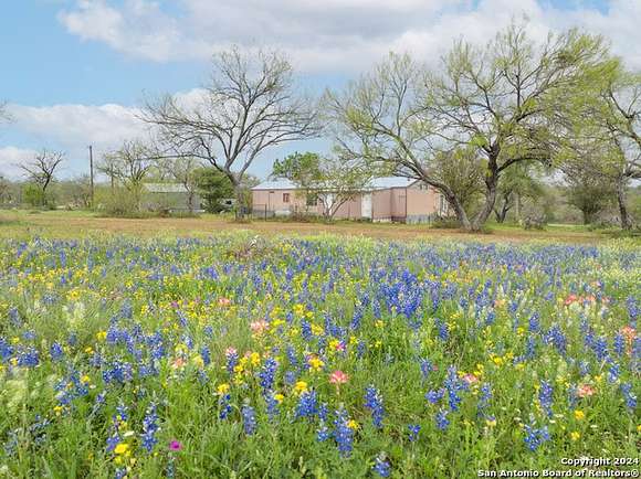 5 Acres of Residential Land with Home for Sale in Lytle, Texas