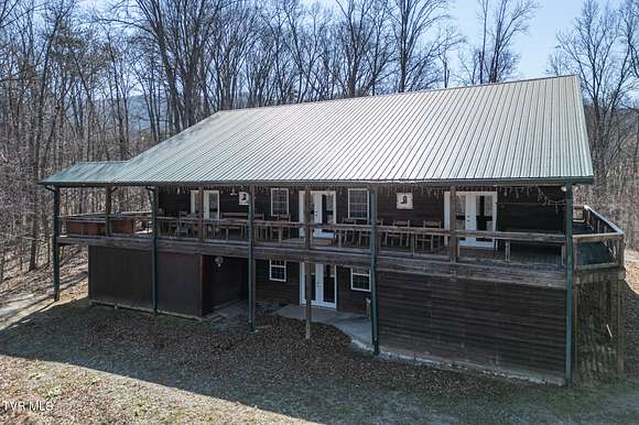 15.1 Acres of Land with Home for Sale in Parrottsville, Tennessee