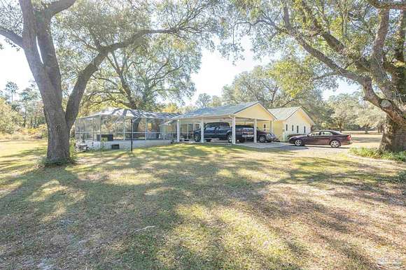 5 Acres of Residential Land with Home for Sale in Milton, Florida