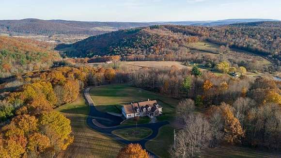 64.43 Acres of Recreational Land with Home for Sale in Ulster, Pennsylvania