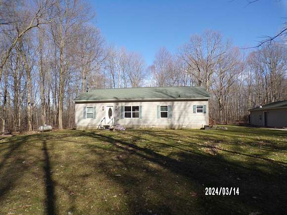 2 Acres of Residential Land with Home for Sale in Burt, Michigan