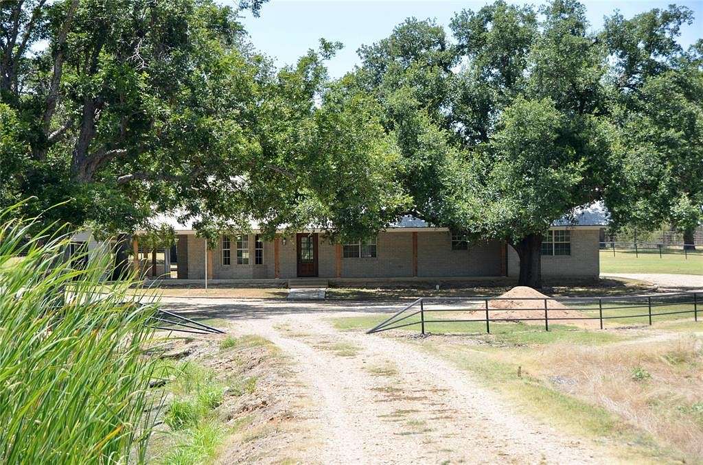 12.2 Acres of Land with Home for Sale in Cameron, Texas