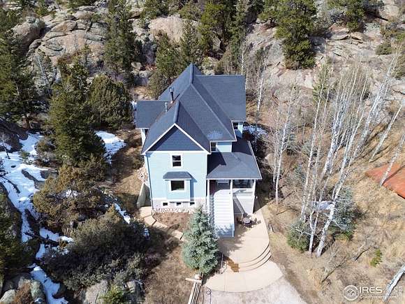 14 Acres of Recreational Land with Home for Sale in Estes Park, Colorado