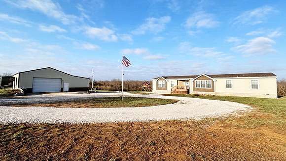 40 Acres of Land with Home for Sale in El Dorado Springs, Missouri