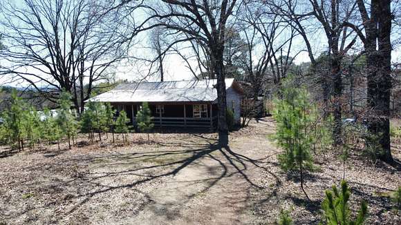 5.9 Acres of Residential Land with Home for Sale in Hagarville, Arkansas