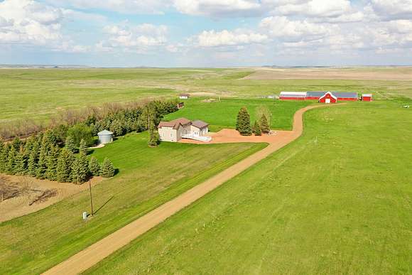 312.83 Acres of Land with Home for Auction in Regent, North Dakota