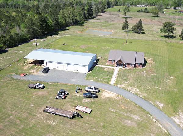 65 Acres of Land with Home for Sale in Atlanta, Texas