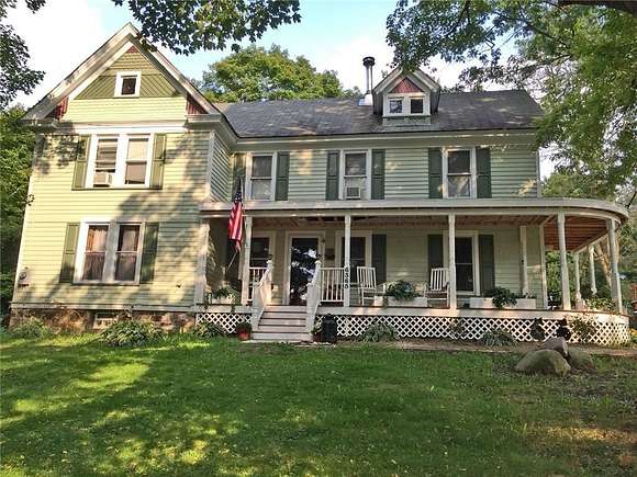 6.5 Acres of Land with Home for Sale in Naples, New York