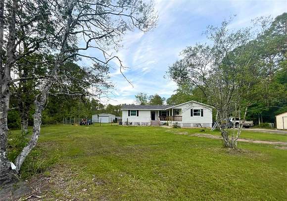 2.3 Acres of Residential Land with Home for Sale in Bunnell, Florida