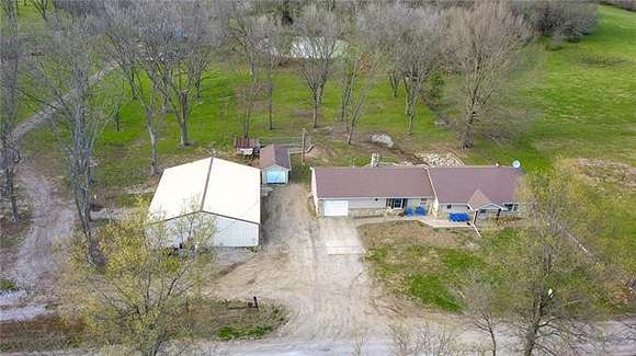 40 Acres of Agricultural Land with Home for Sale in Butler, Missouri