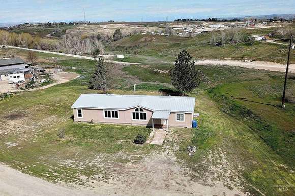 3.6 Acres of Residential Land with Home for Sale in Fruitland, Idaho