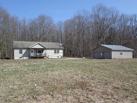 61.1 Acres of Recreational Land with Home for Sale in Corry, Pennsylvania